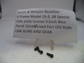 Black screws on a white card with text about Smith & Wesson Revolver on a light gray background