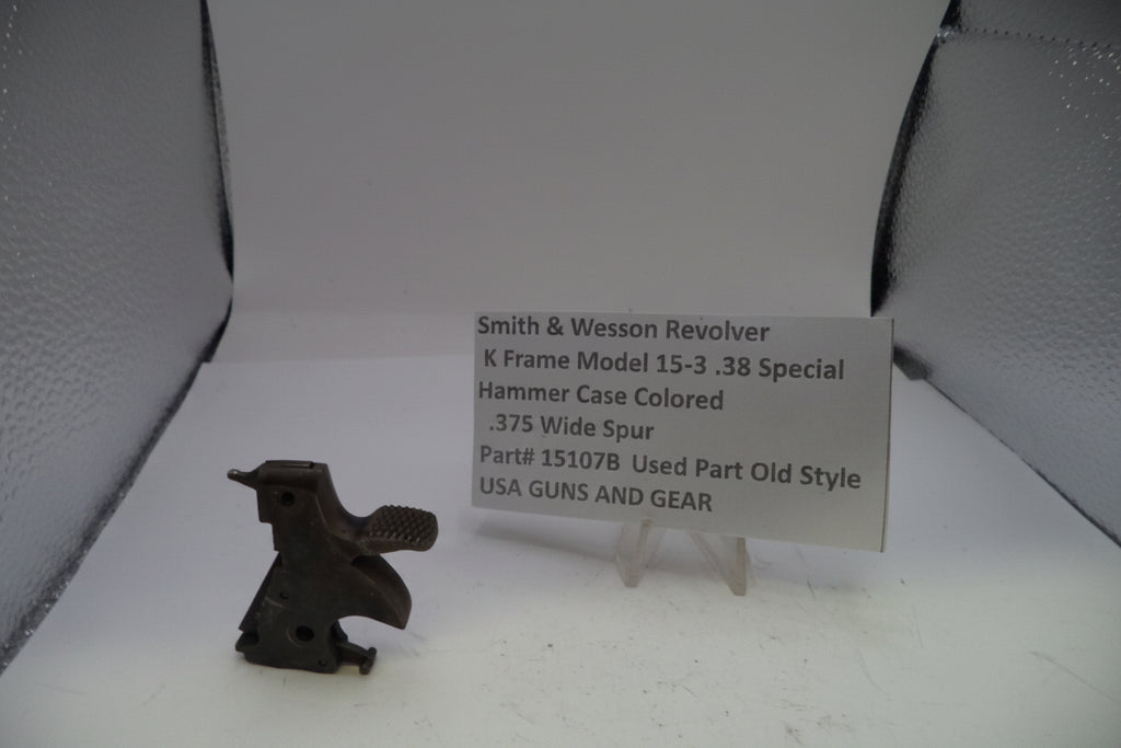 Small metal object next to a descriptive card on a white background