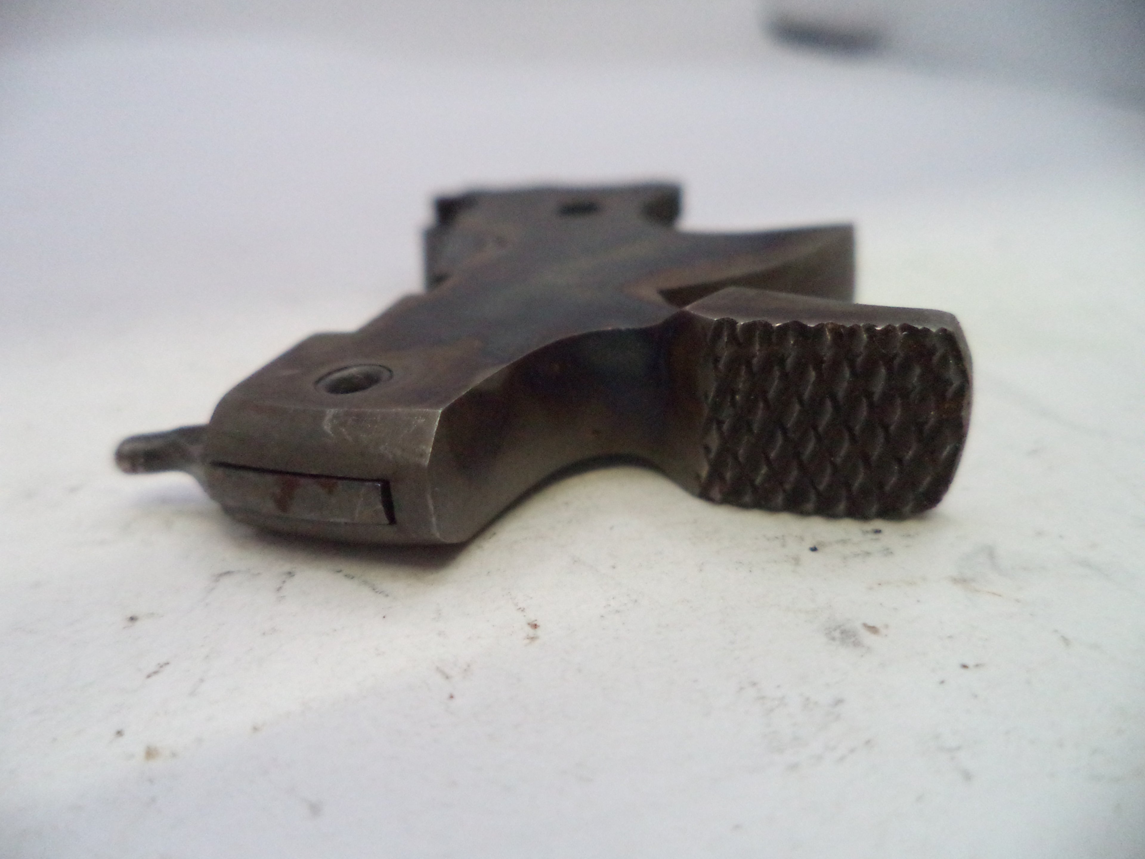 Metal tool with textured surface on a white background