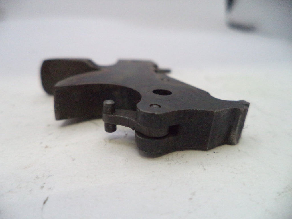 Metal mechanical component on a white surface
