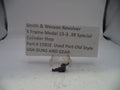 Smith & Wesson revolver cylinder stop with a descriptive card on a white background