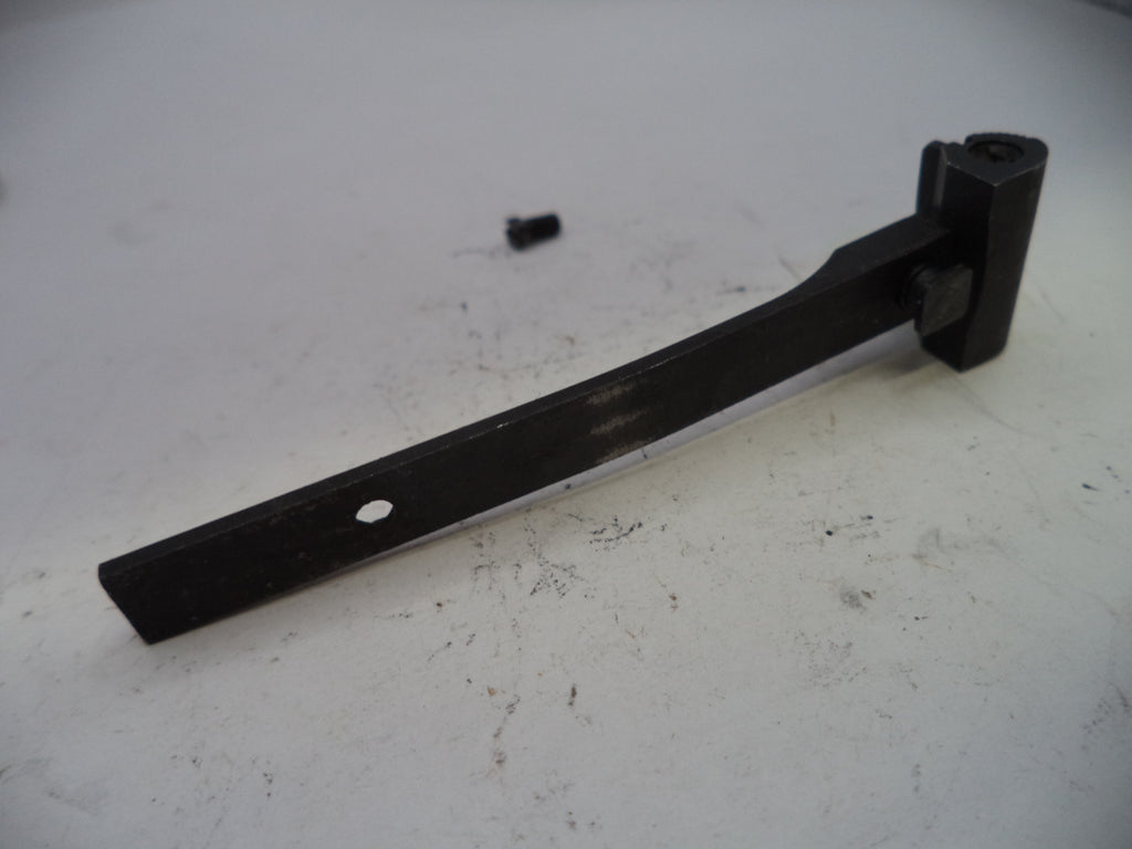 Black metal bracket on a white surface