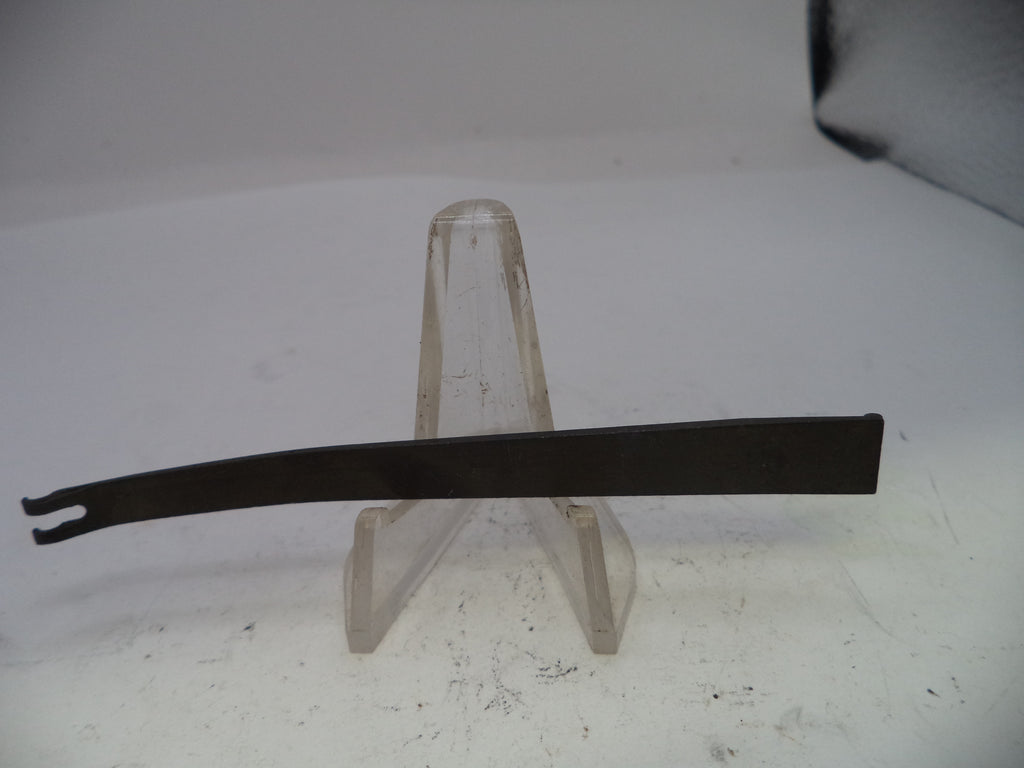 Metal tool on a stand against a white background
