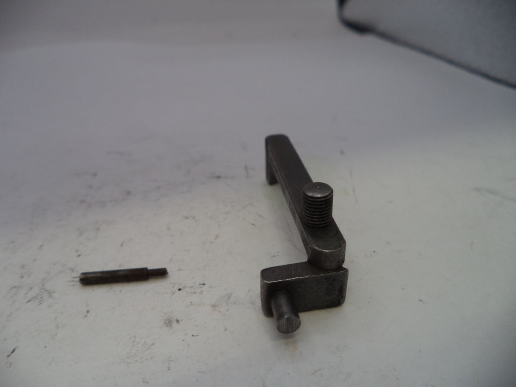 Metal tool on a white surface