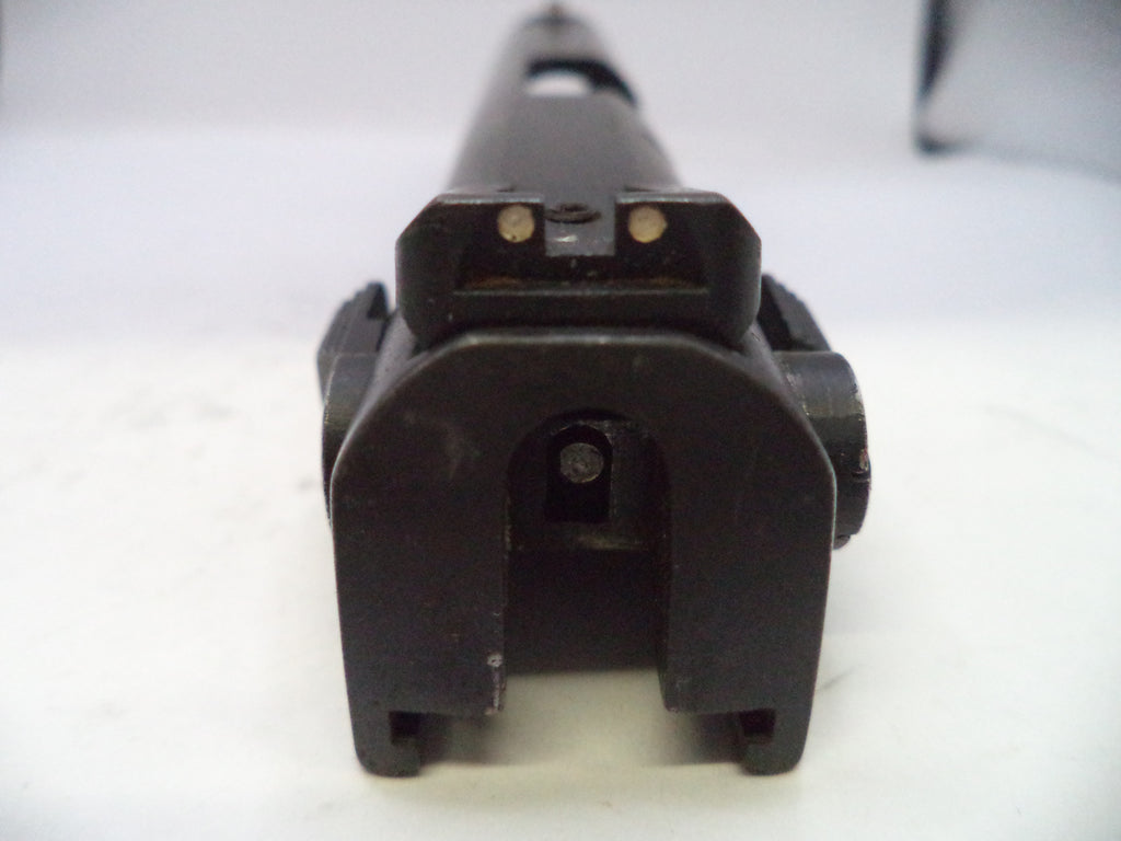Close-up of a black mechanical component on a white background