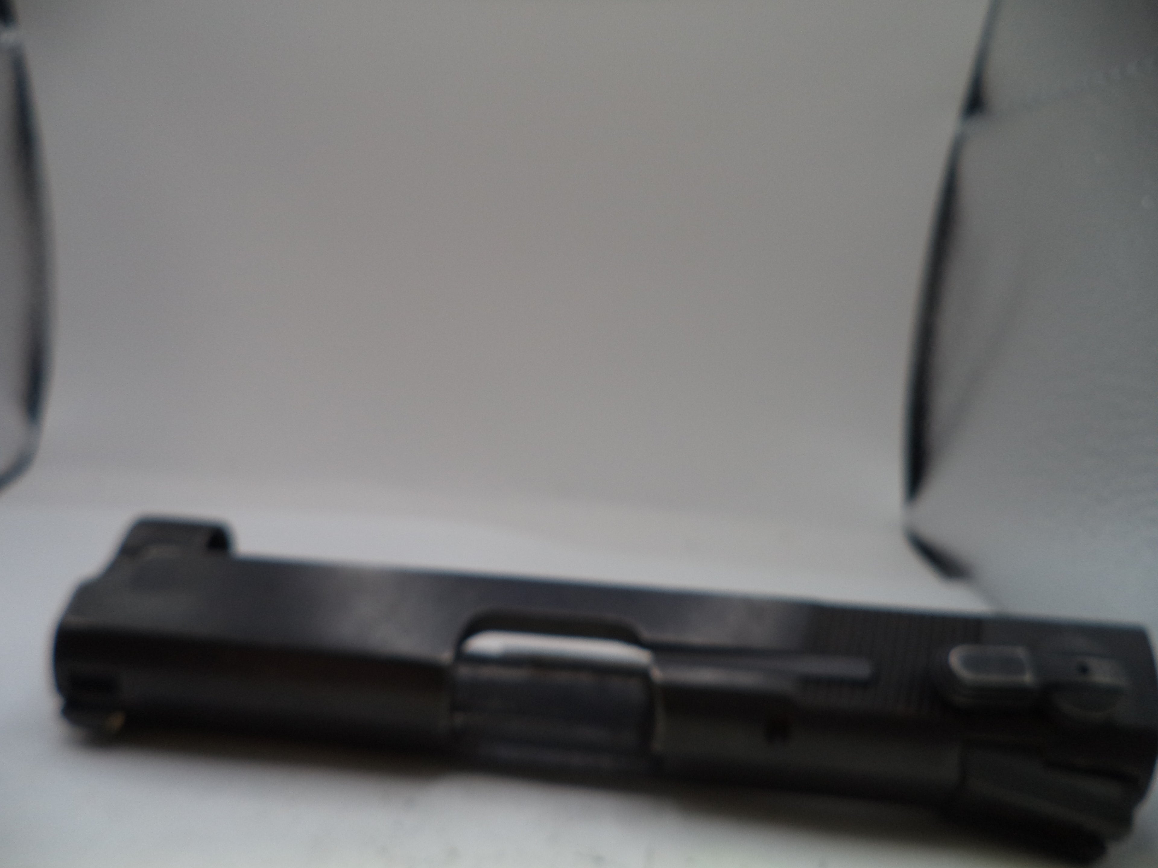 Black electronic device on a white surface