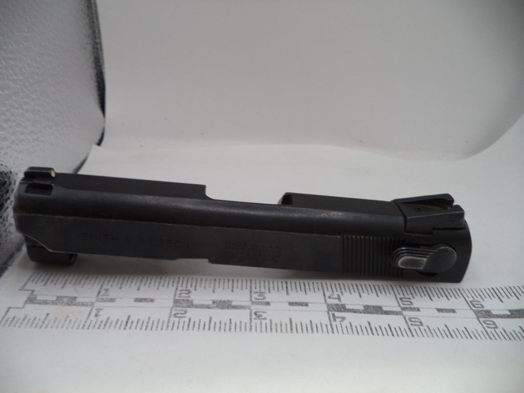 Black gun stock on a white surface with measurement chart