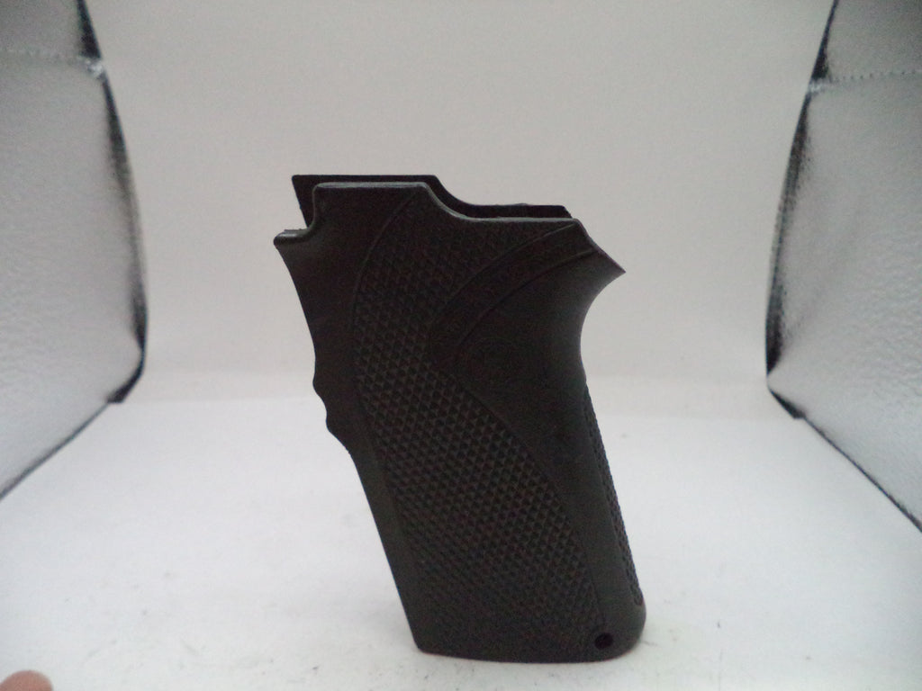 Black textured gun grip on a light gray background