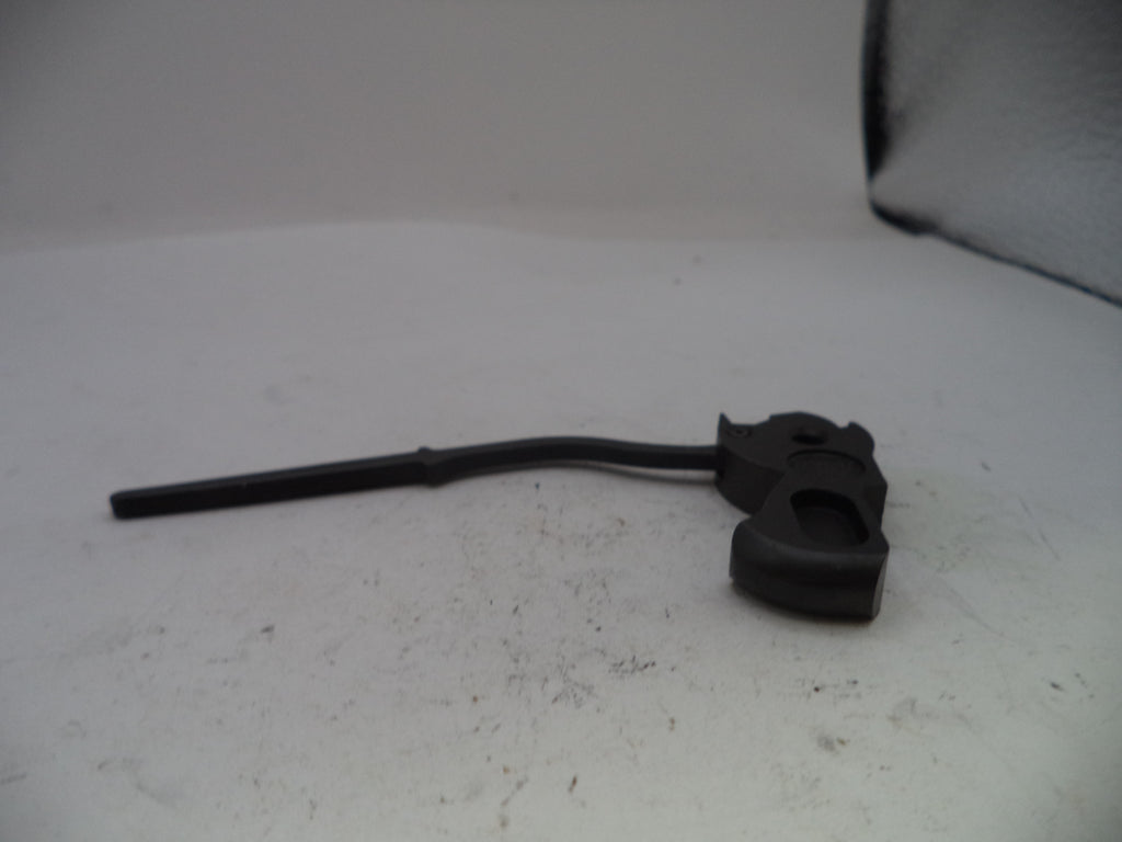 Black metal component on a white surface