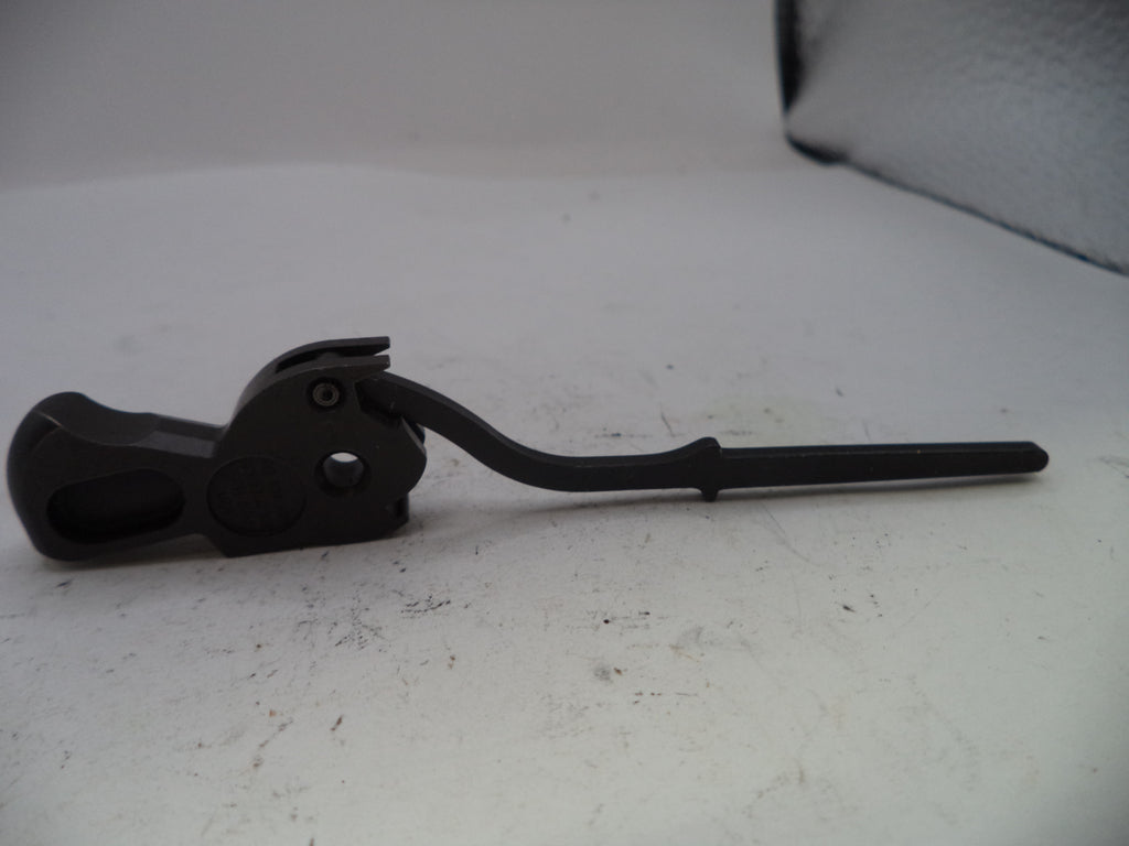 Black lever or handle on a white surface