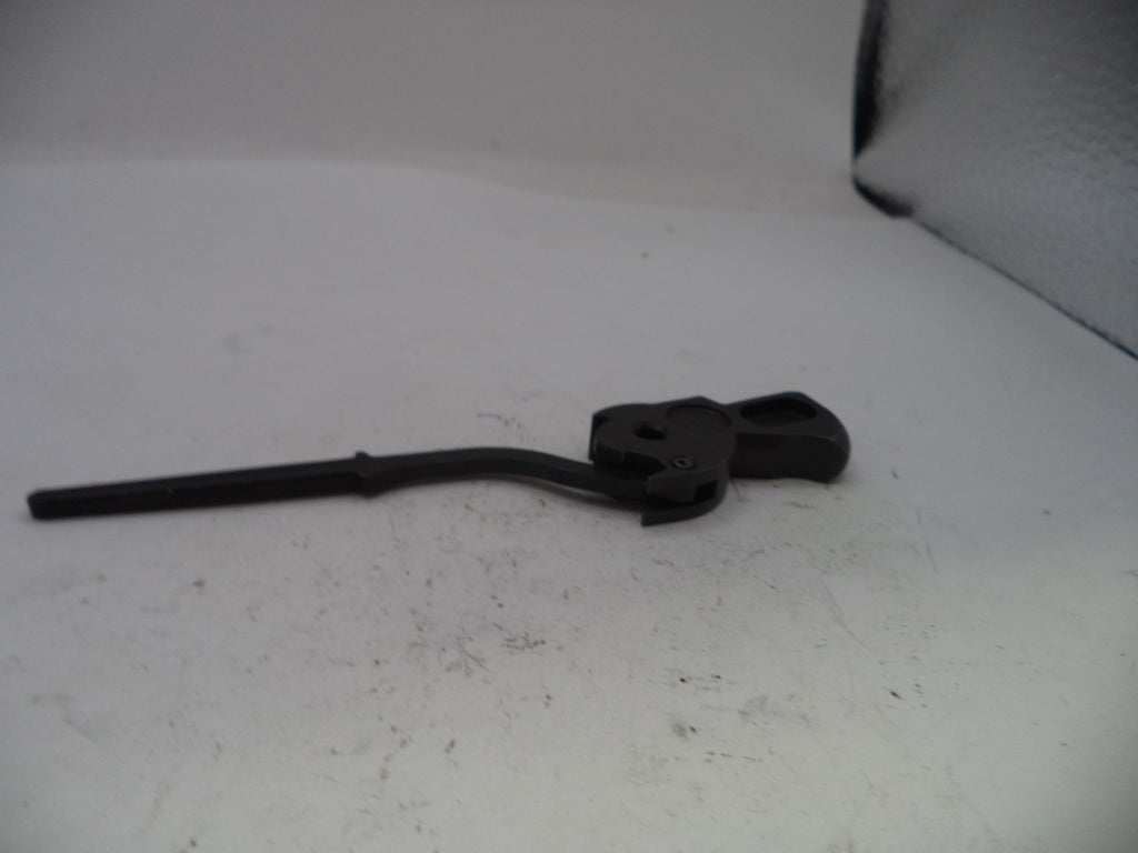 Black metal lever on a white surface