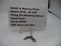 Firing pin retaining spacer for Smith & Wesson Pistol Model 457D .45 ACP on a white background with a label.