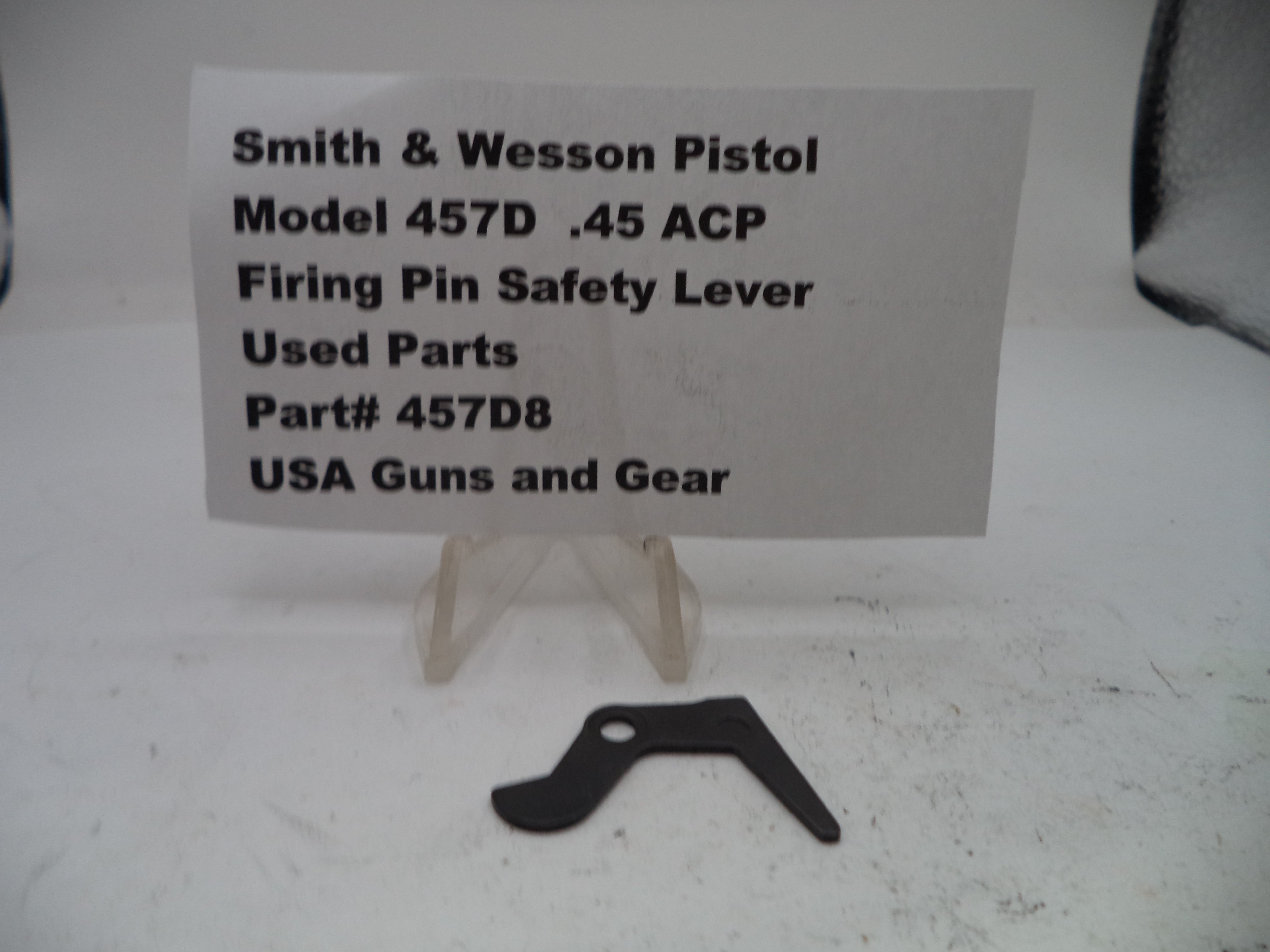 Firing pin safety lever for Smith & Wesson Pistol Model 457D .45 ACP on a white background with a label.