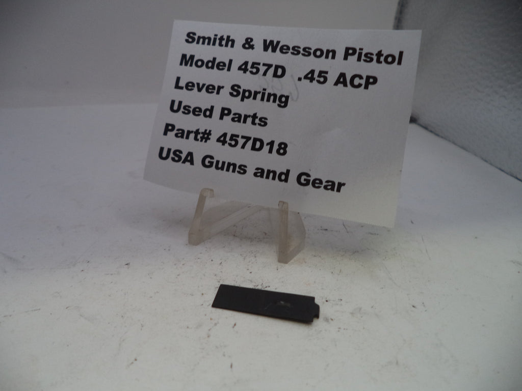 Smith & Wesson pistol lever spring with a sign on a white background