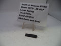 Smith & Wesson pistol lever spring with a sign on a white background