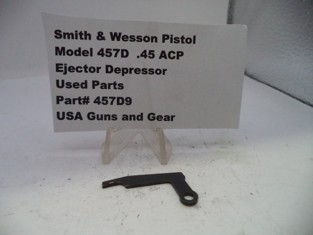 Black ejector depressor for Smith & Wesson Pistol Model 457D .45 ACP on a white background with a label.