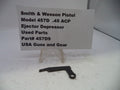 Black ejector depressor for Smith & Wesson Pistol Model 457D .45 ACP on a white background with a label.