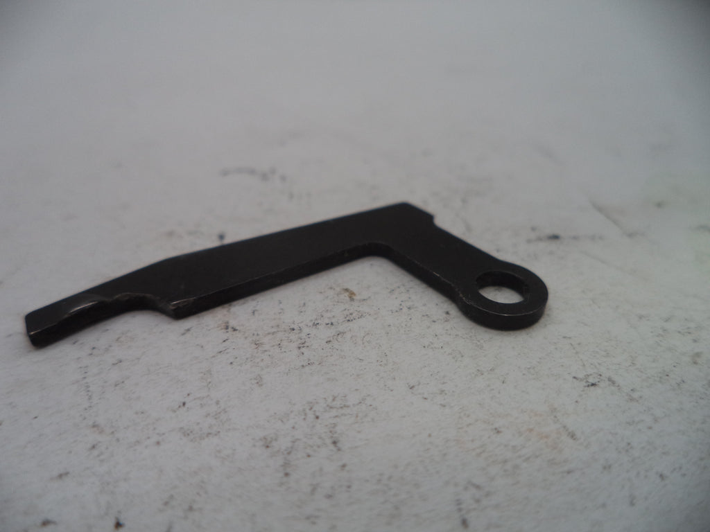 Black metal lever on a light gray surface