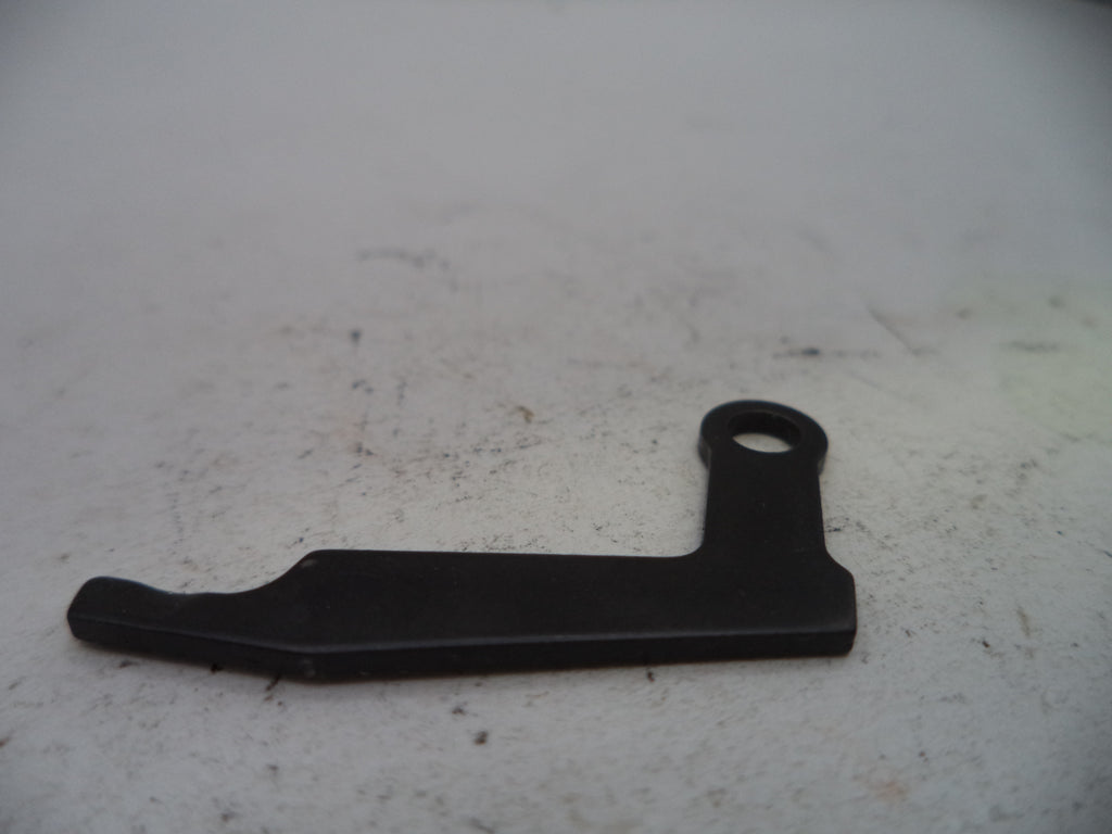 Black metal lever on a textured white surface