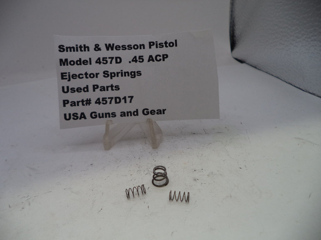Smith & Wesson pistol ejector springs with a label on a white background
