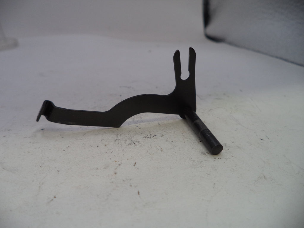 Black metal tool on a white surface
