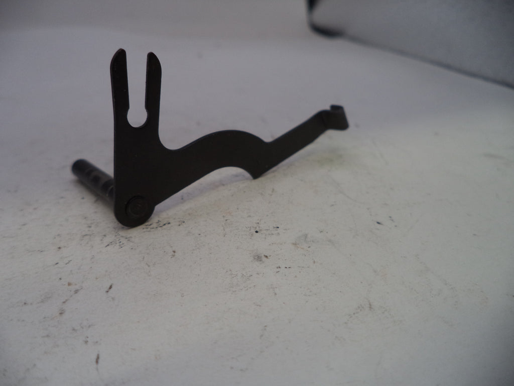 Black metal bracket on a white surface