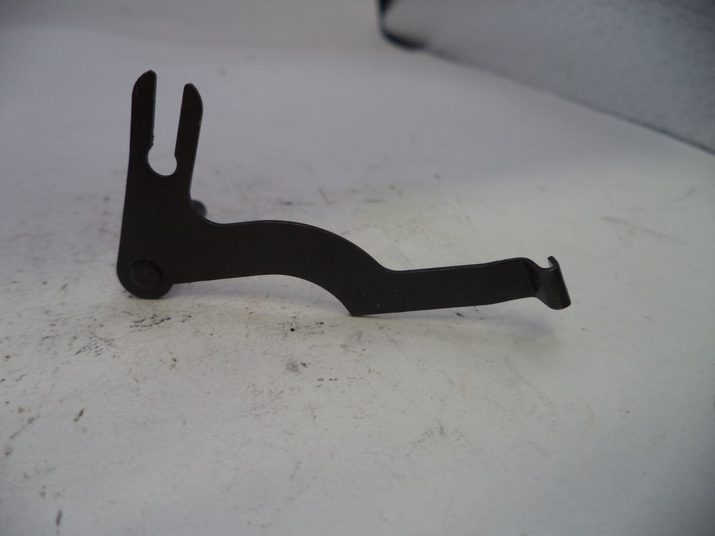 Black metal bracket on a white surface