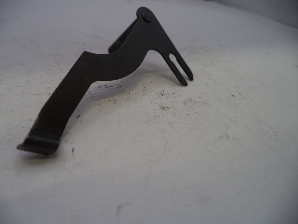 Black metal bracket on a white surface