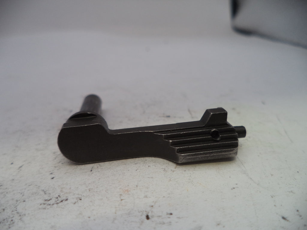 Black metal mechanical component on a white surface