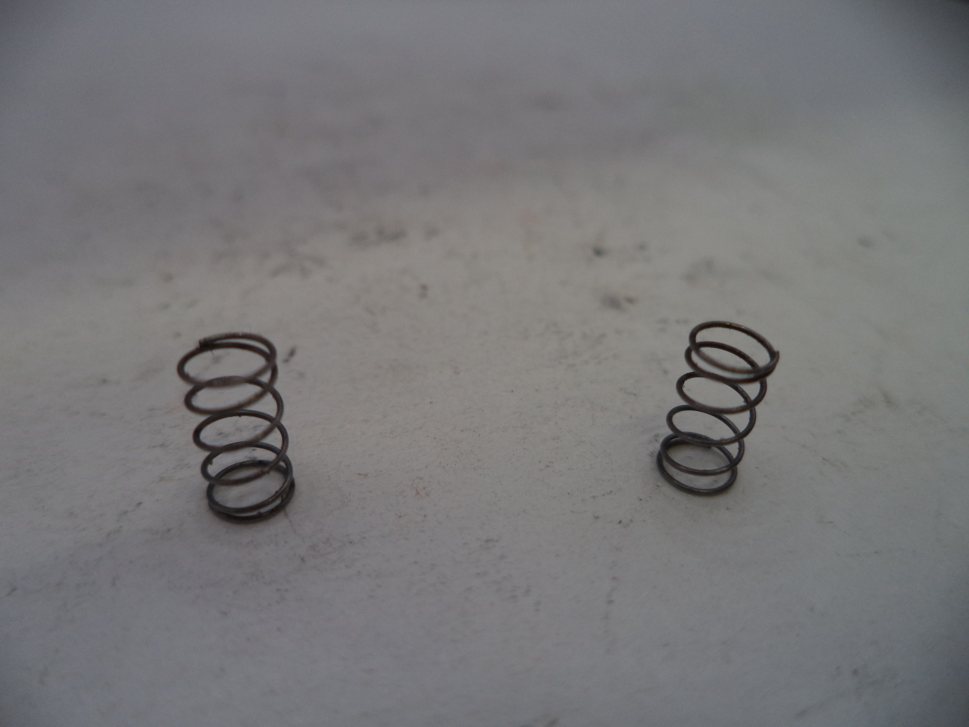 Smith & Wesson Model 457D Ejector Spring, Used - Part# 457D17