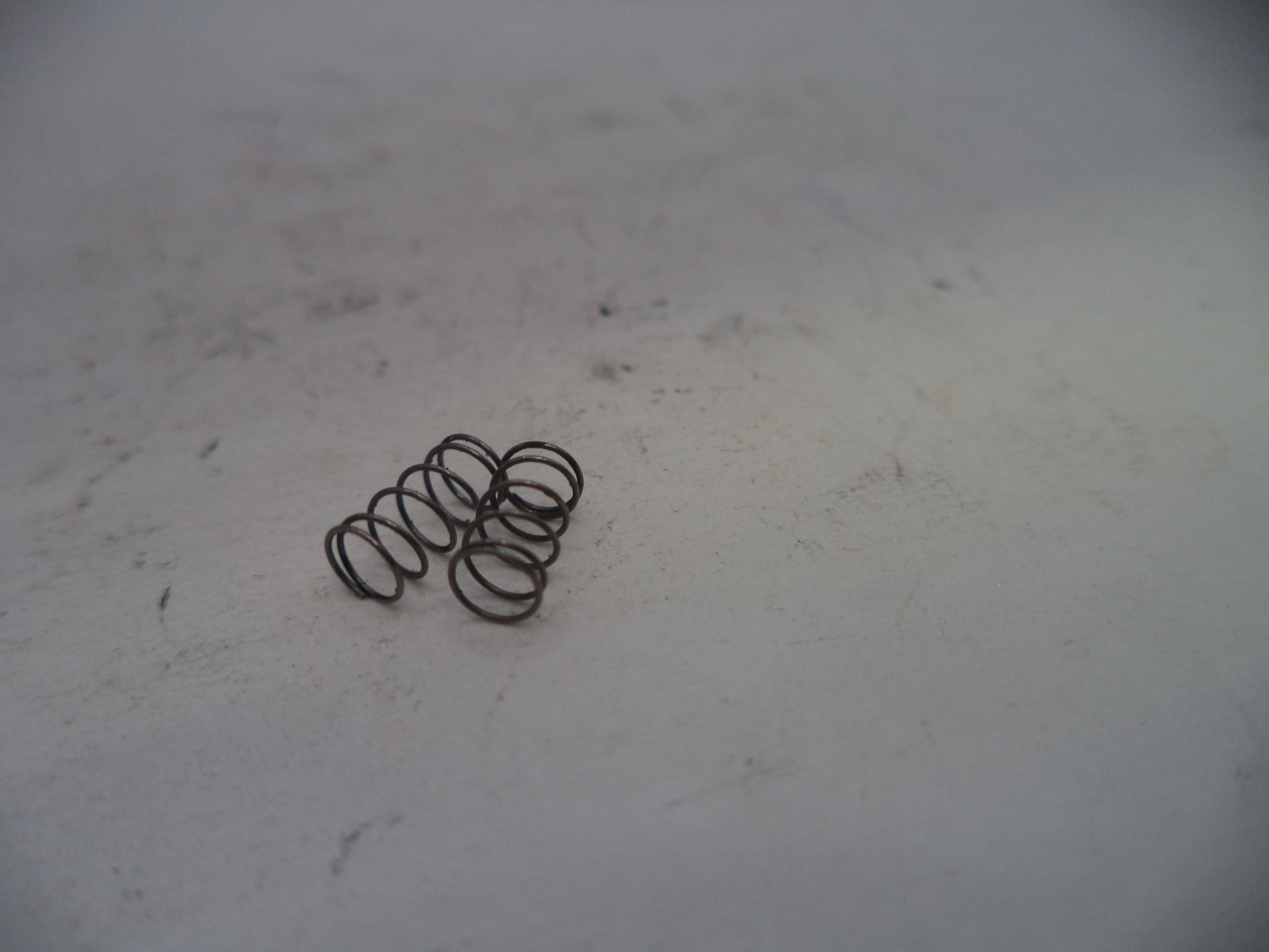 Smith & Wesson Model 457D Ejector Spring, Used - Part# 457D17