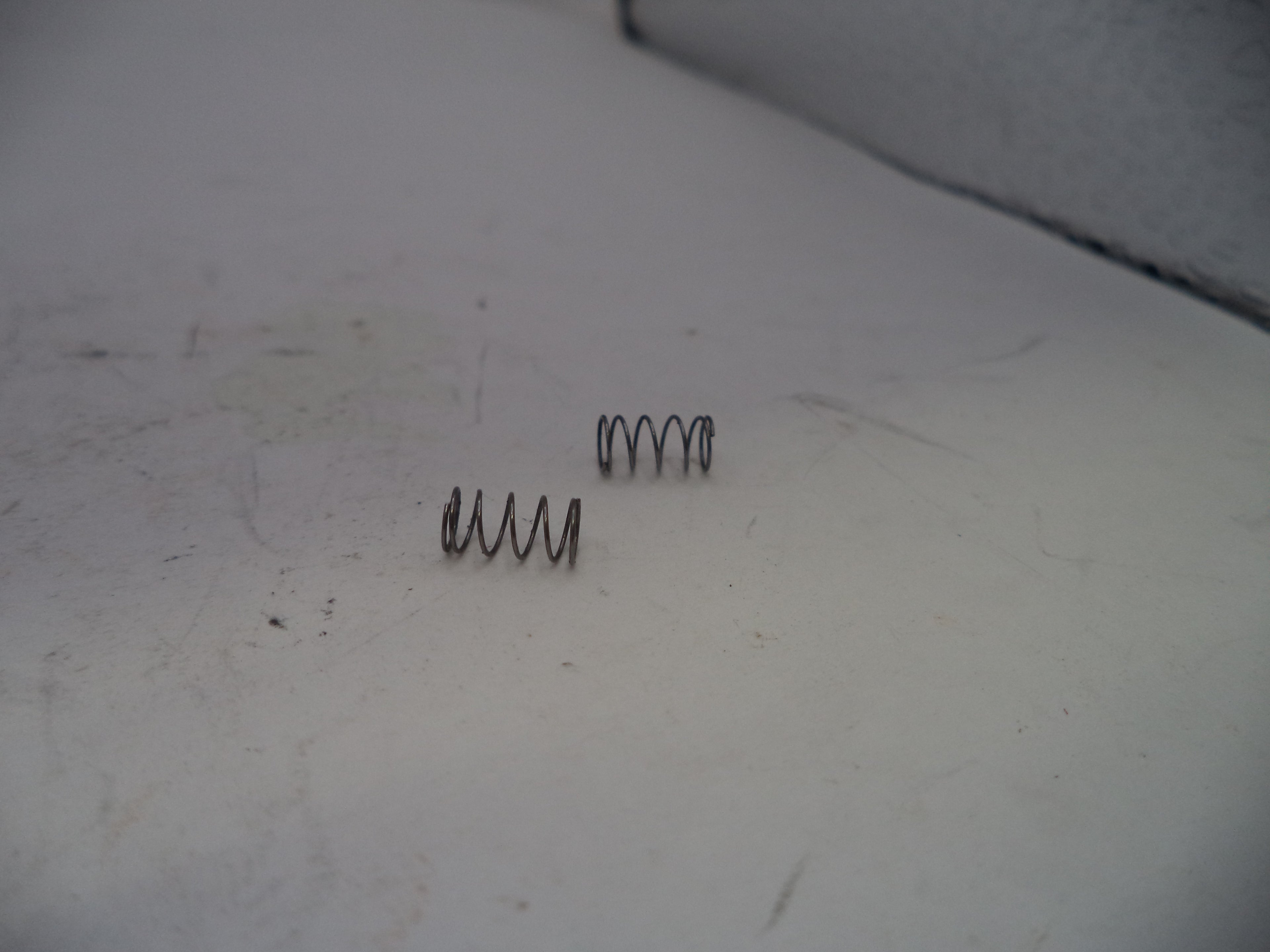 Smith & Wesson Model 457D Ejector Spring, Used - Part# 457D17