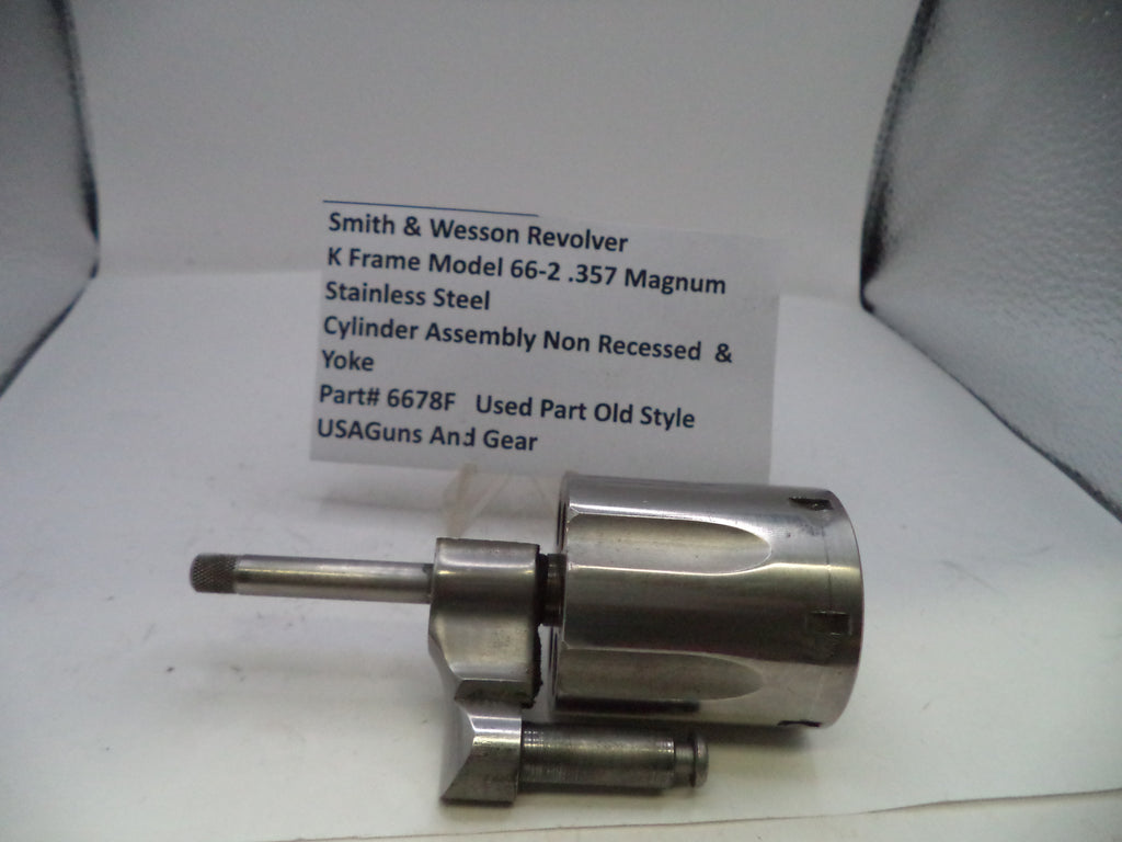 Smith & Wesson revolver cylinder assembly on a white background with a label.