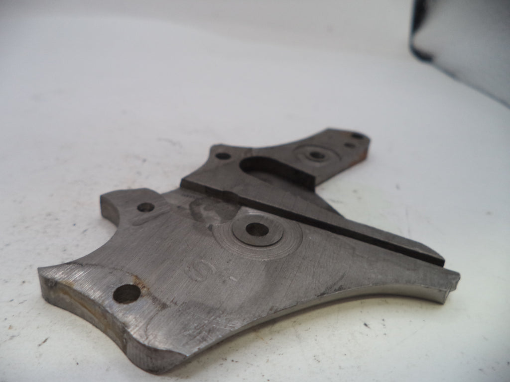 Metal mechanical component on a white surface