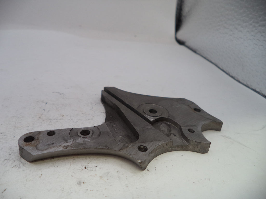 Metal mechanical component on a white surface