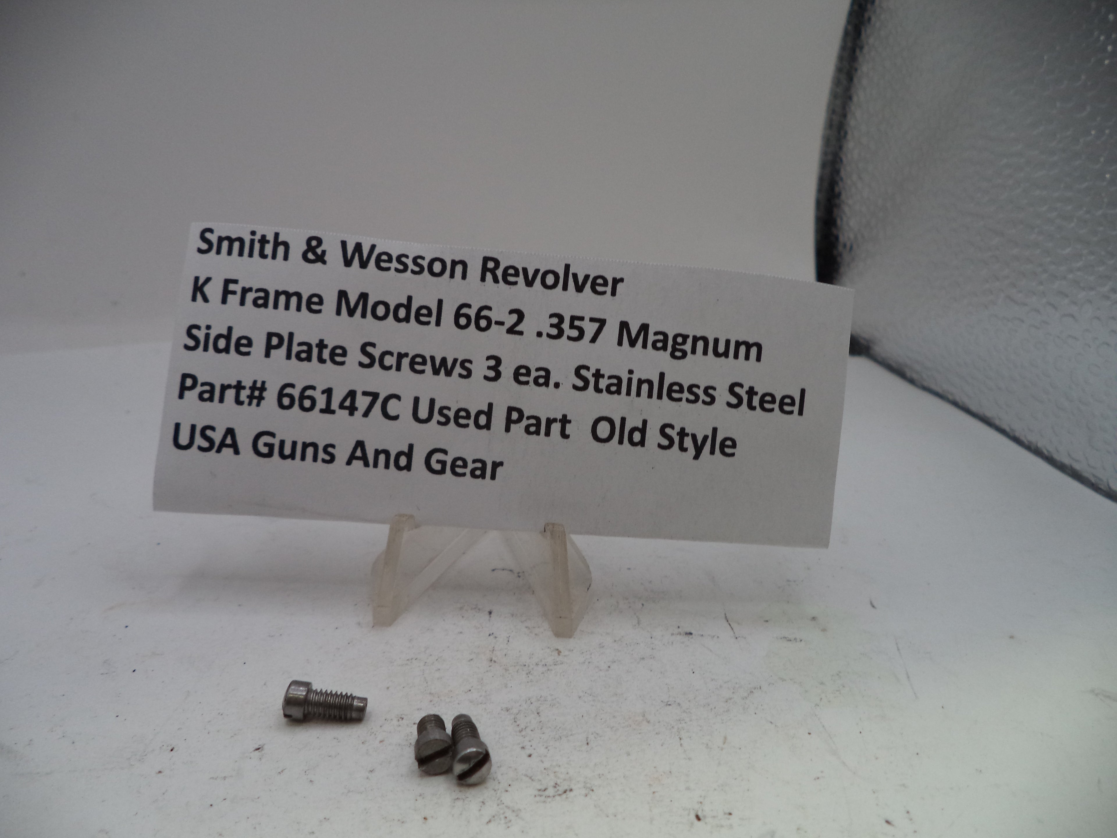 Smith & Wesson revolver K Frame Model 66-2 .357 Magnum side plate screws with a label on a white background.