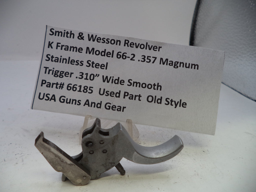 Smith & Wesson revolver part with descriptive card on a white background