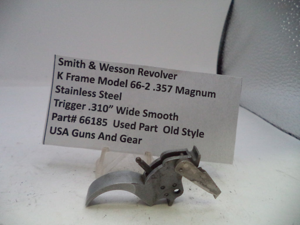 Smith & Wesson revolver part with descriptive card on a white background