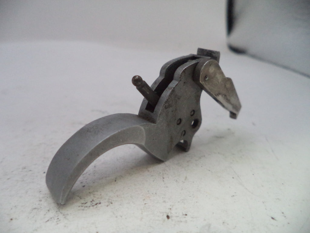 Metal tool or component on a white background