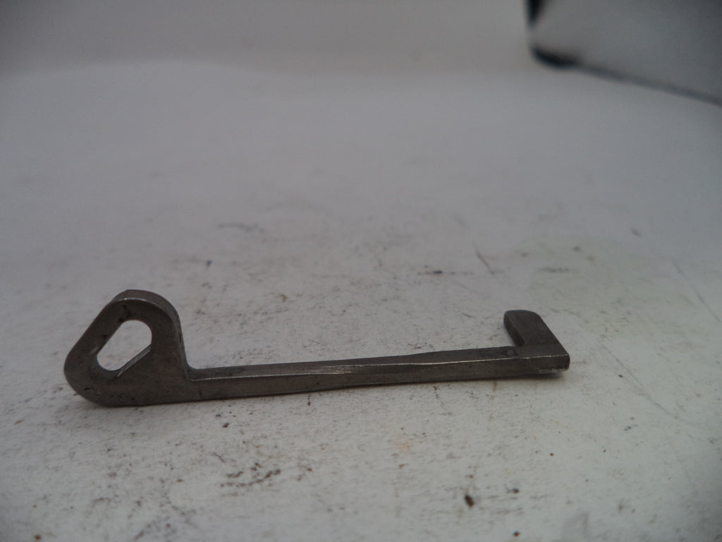 Metal key on a white surface