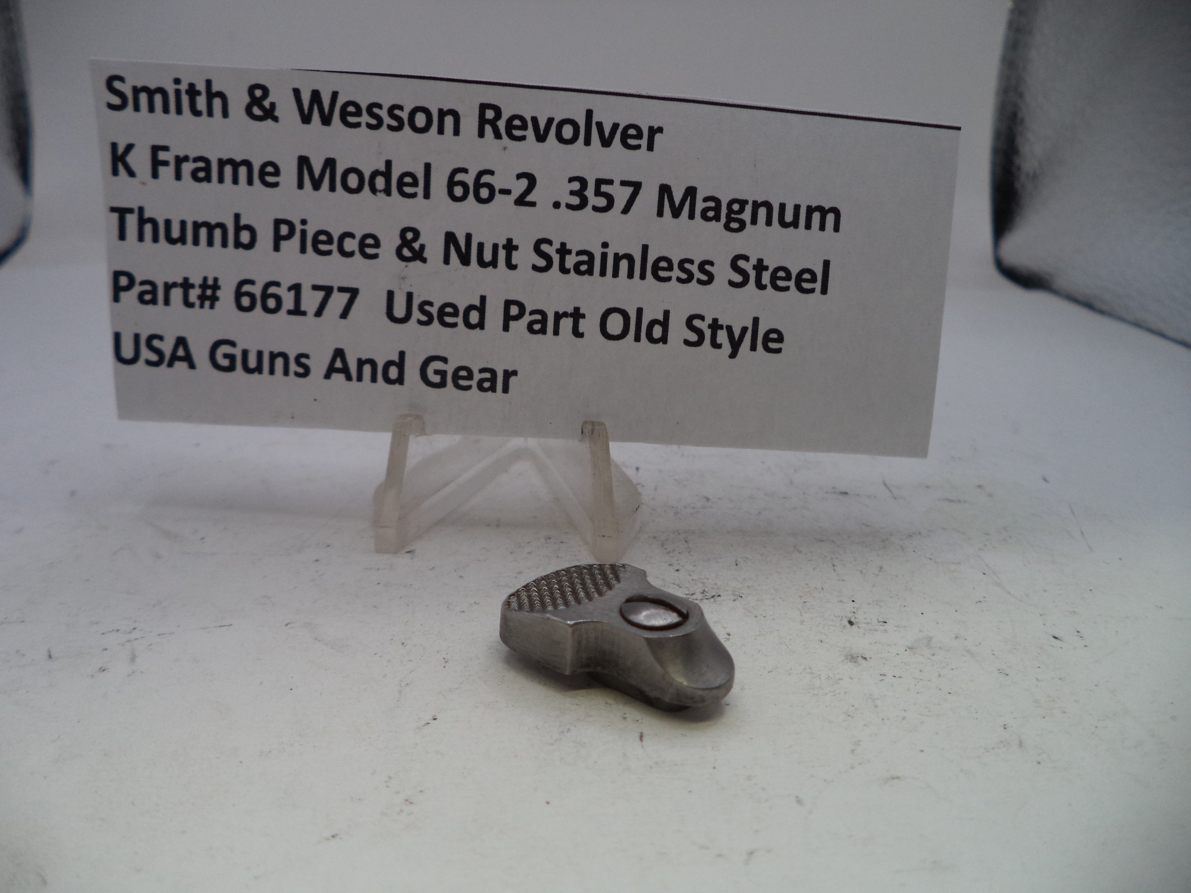 Smith & Wesson revolver part on a white background with descriptive text card.