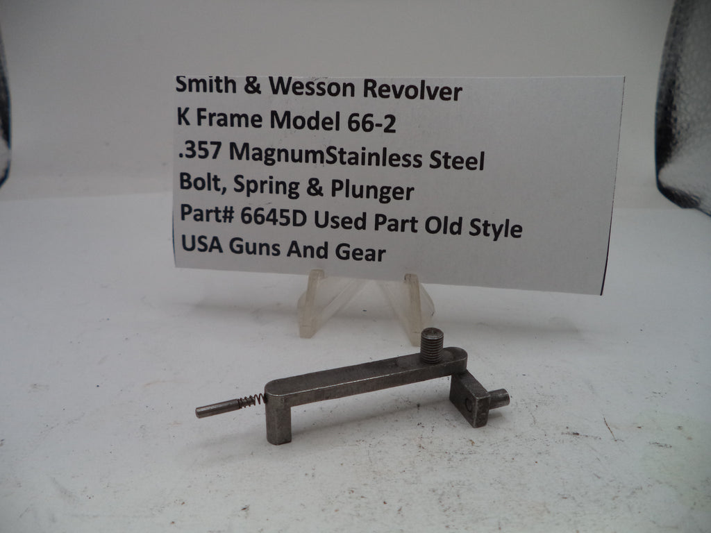 Small metal tool with descriptive text card on a white background