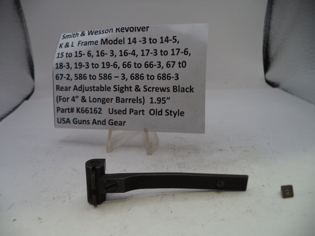 Black revolver part with descriptive label on a white background