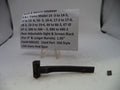 Black revolver part with descriptive label on a white background