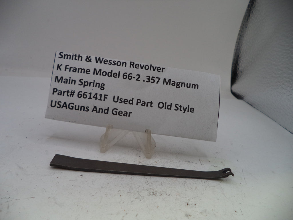 Smith & Wesson revolver main spring part with a label on a white background