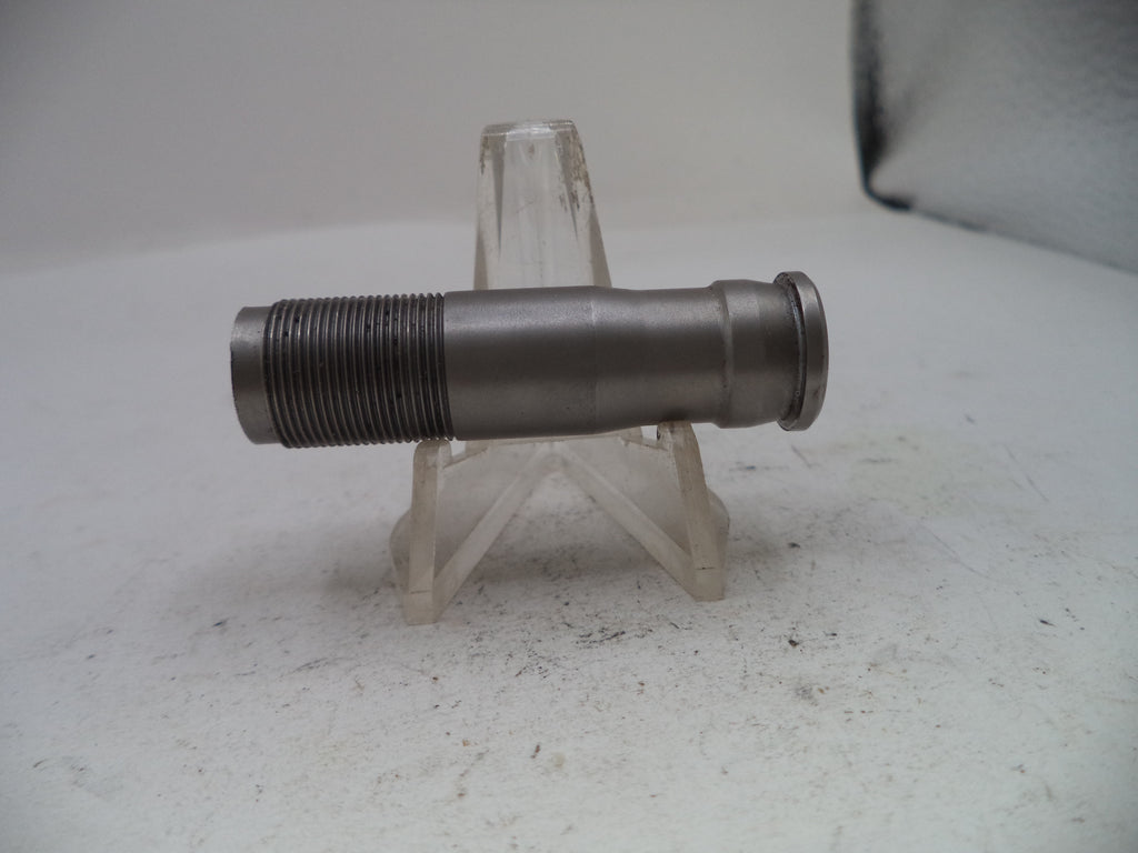 A metallic cylindrical threaded component, likely a mechanical part or fitting, displayed horizontally on a clear plastic stand against a light gray background.