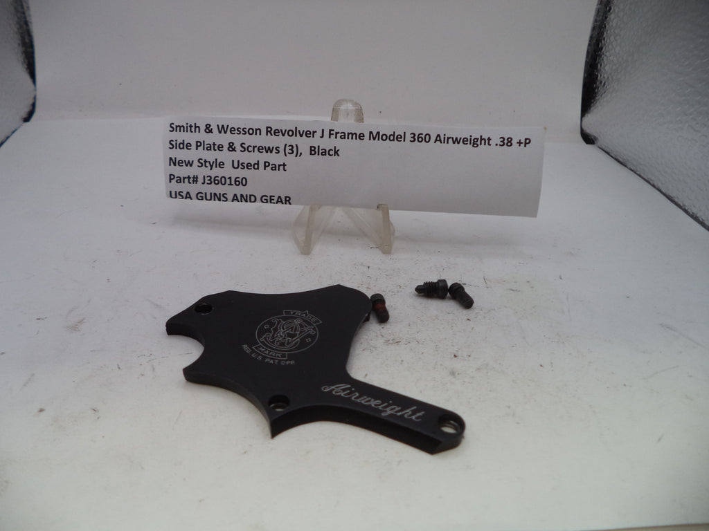 A black Smith & Wesson Revolver J Frame airweight side plate and screws, shown with a white product information card on a white surface.