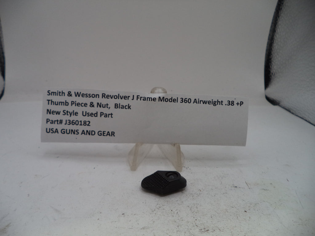 A small black used replacement part for a Smith & Wesson Revolver J Frame Model 360 airweight, displayed on a clear stand next to a white label card with part details.