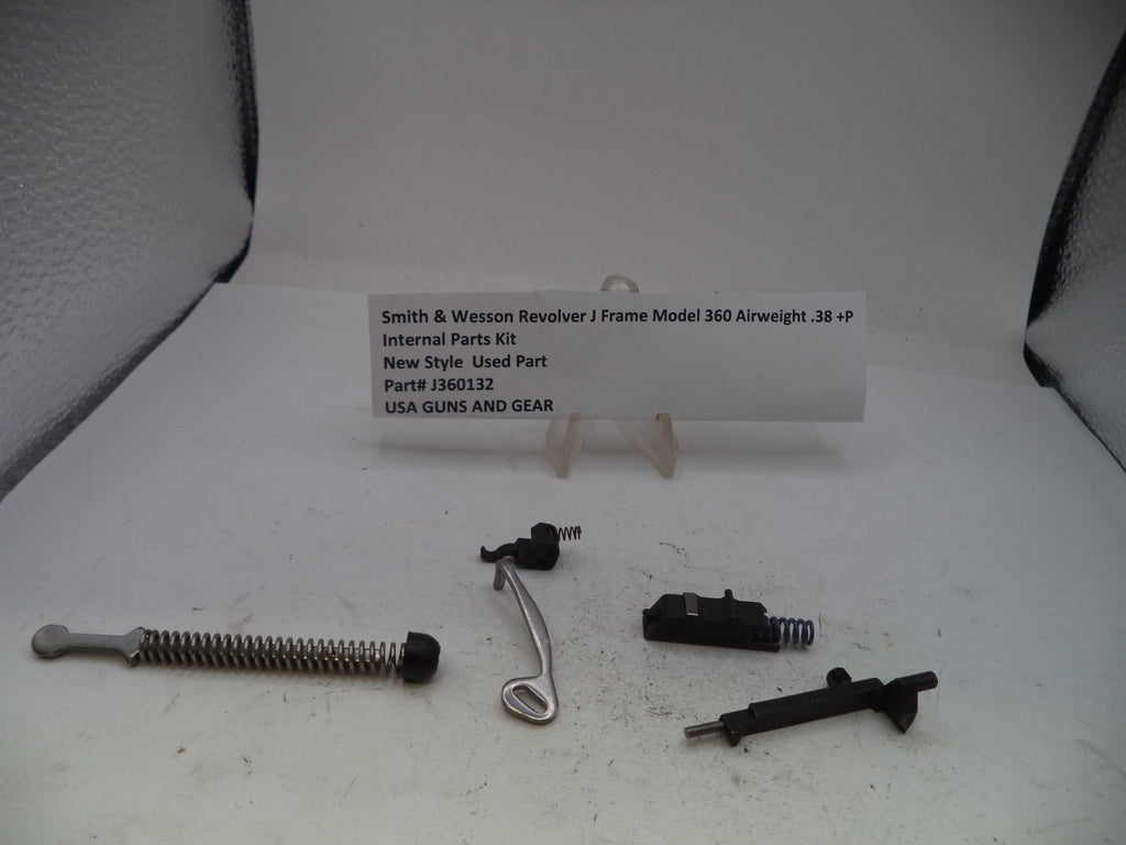 Smith & Wesson Revolver J Frame Model 360 Airweight internal parts kit, including a long silver coil spring, a curved silver metal piece, and two black metal components, displayed on a white surface with a product information card.