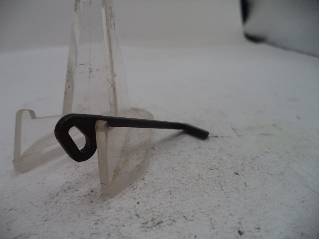 A pair of black metal-framed glasses displayed on a clear plastic stand against a light gray background.